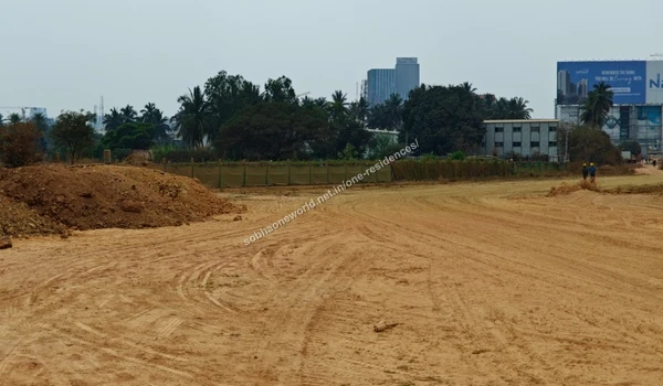 Compacted Terrain Progress Active earth stabilization and leveling progress on the raised internal dirt pathways of Sobha One Residences