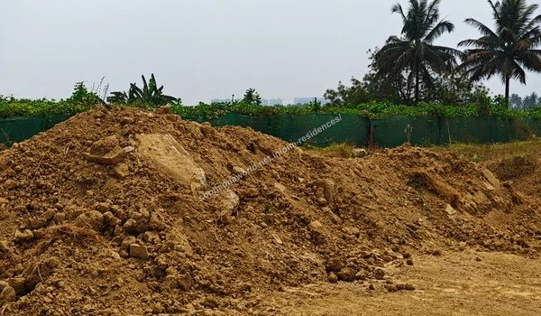 Site Preparation Cleared pathways and graded areas showing early site preparation progress for Sobha One Residences