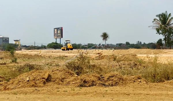 Soil Heaps Multiple heaps of excavated soil staged on the graded grounds of the Sobha One Residences site