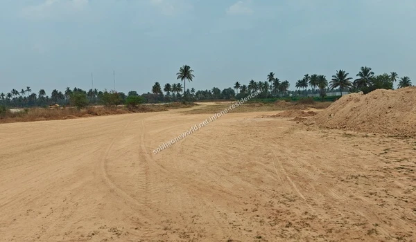 Excavated Soil Mounds Assorted mounds of excavated soil and sand stretching across the Sobha One Residences site