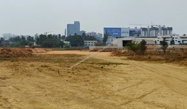 Graded Expanse Wide open expanse of fully graded sandy terrain preparing for development at Sobha One Residences