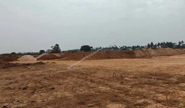 Plot Development Ongoing plot development and graded earth surfaces at the Sobha One Residences property location