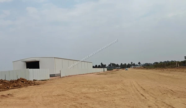 Wide angle view of the ongoing temporary site office construction and land preparation at Sobha One Residences
