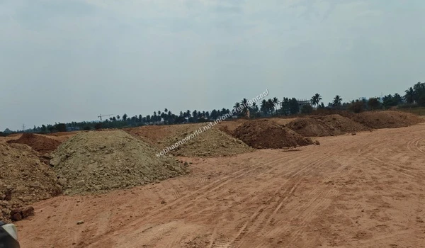 Site Pathway Grading Graded sandy pathways and uneven terrain being prepared at the Sobha One Residences property location