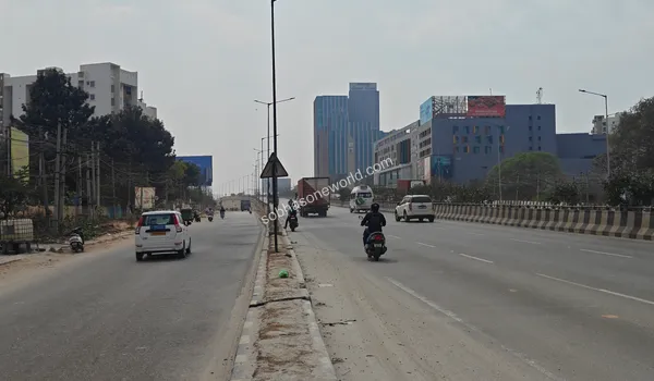 Broad transit avenue showcasing the excellent road conditions and corporate infrastructure neighboring Sobha One World
