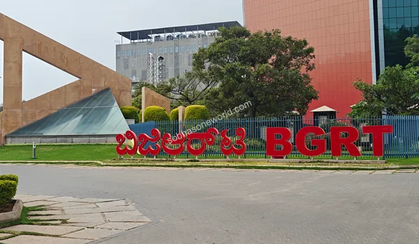 Grand entrance to the bustling commercial district showing well-planned infrastructure and roadways neighboring Sobha One World
