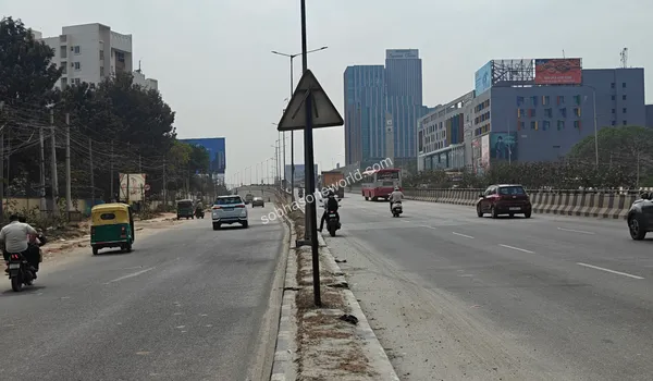 The extensive multi-lane road heading in the direction of KR Puram showcasing the accessibility of Sobha One World