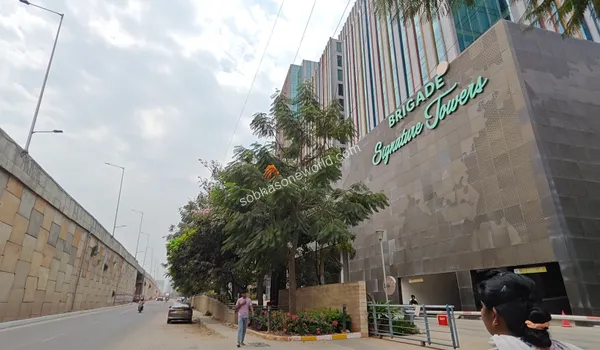 Commuters passing by the grand entrance of the premium employment zone ensuring a hassle-free transit near Sobha One World