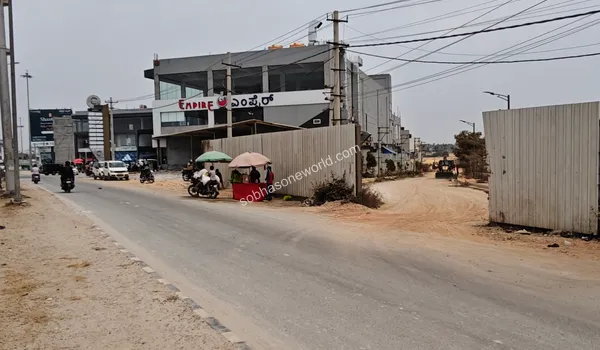 View of the designated access lane leading directly to the Sobha One World construction site entrance.