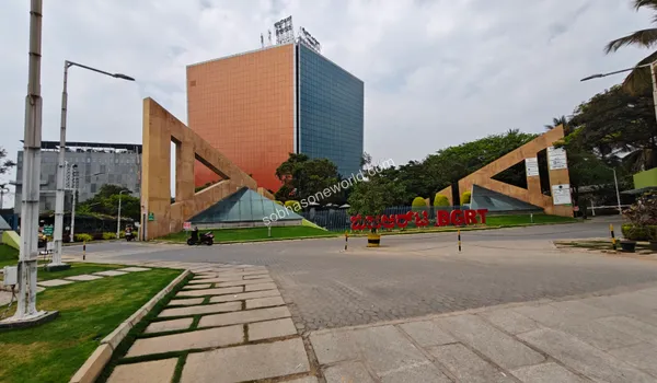Broad entrance driveway leading into the premium research facility showcasing smooth transit points near Sobha One World